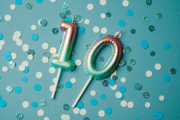 Number candles on a festive table for a child's 10th birthday celebration