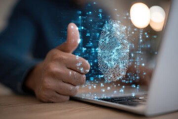 Thumbs up over laptop with digital fingerprint overlay