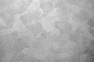 Naklejka premium Gray textured plaster wall with abstract background