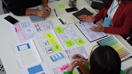 Successful web designers excellent teamwork and success at the office. - Powered by Adobe