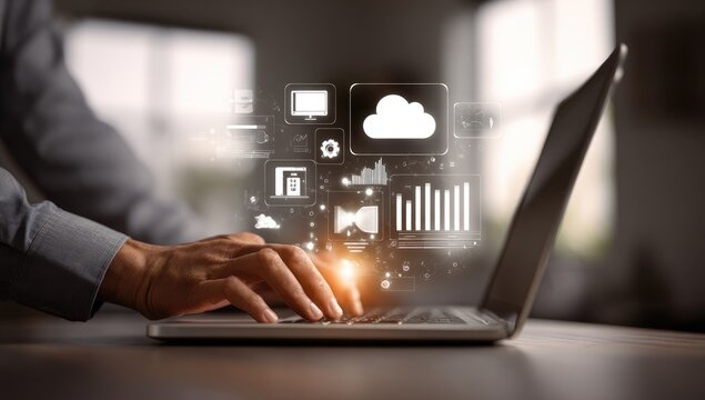 Person using laptop with digital interface overlay