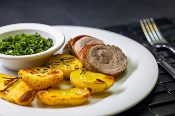 pork roll with spinach and roasted potatoes