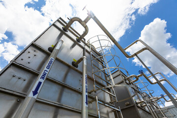 Sets of cooling towers in data center building.