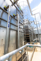 Sets of cooling towers in data center building.