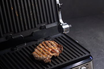 beef steak grilled on the electric grill