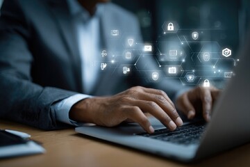 Businessperson using laptop, security icons overlay