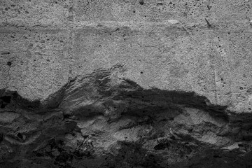 Textured concrete wall with pitting for concept of architectural surface detail