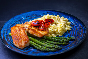Green asparagus with fish fillet and couscous