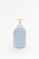 white plastic bottle with liquid soap