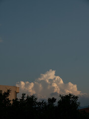 Fototapeta premium Evening sky gradient with clouds still touched by the setting sun