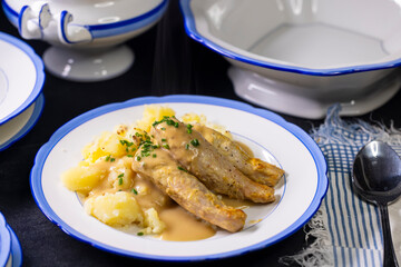 rabbit with cream sauce and mashed potatoes