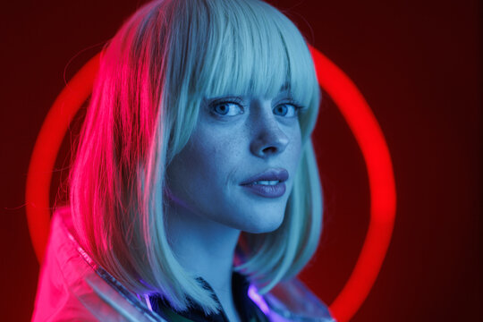 portrait woman in futuristic costume. Augmented reality game, future technology.