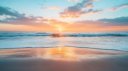 Obraz premium Ocean Waves Rolling Onto Sandy Beach at Sunset with Warm Sky