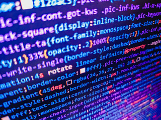 Computer. Developer occupation work photo. Program code PHP HTML CSS of site. Abstract program code on computer screen. Programming source code abstract screen of software developer