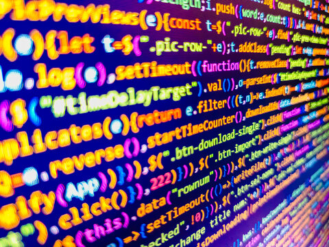 Computer language script code screen. Background of software developer script. Program code with display. Screen display of computer script coding. Closeup of Java Script and HTML code