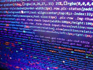 Shallow Depth of Field effect. Web developer HTML code with CSS on screen. Monitor your networked computers at the protocol level with a command line to prevent ransomware