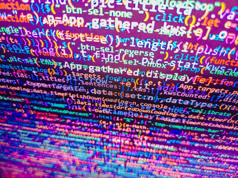 The word 'Security Breach' mixed in a random minified javascript code with syntax highlighting. Javascript code in bracket software
