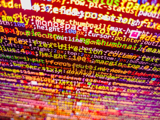 Website codes on computer monitor. Computer interface. Programmer occupation. Digital binary computer code. Mobile app building. Programming Coding with editor colorful themes