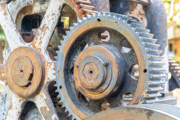 Old, rusty cogwheels on an old industrial machine