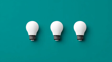 Three light bulbs on a teal background, symbolizing ideas.