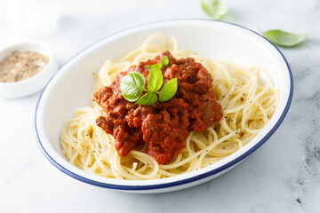 Traditional spaghetti Bolognese with fresh basil