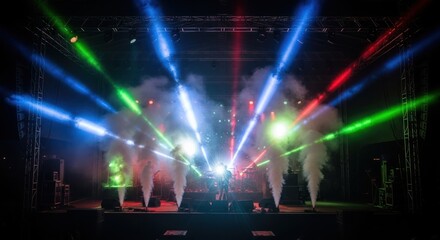 Dynamic stage lighting and special effects create electrifying energy at a concert event
