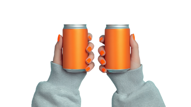 Two orange soda cans held by hands with matching orange nails on black backdrop