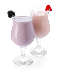 Different tasty milkshakes in glasses isolated on white