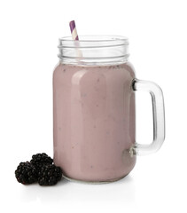 Tasty blackberry milkshake in mason jar and berries isolated on white