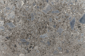 abstract background of dark grey stone wall texture close up