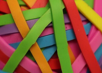 Close-Up of Brightly Colored Interwoven Rubber Bands in Abstract Display