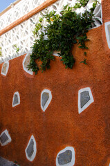 View of Mediterranean style building wall in terracotta color , abstract aesthetic detail for...