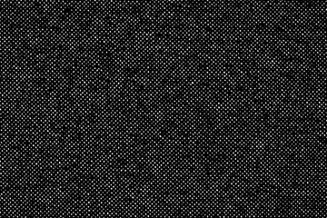 Black fabric texture with subtle white dots pattern.