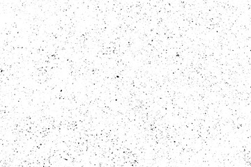 Abstract black speckled texture on a white background.