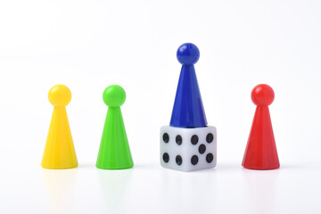 Playing pieces and dice isolated on white background