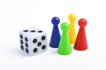 Playing pieces and dice isolated on white background