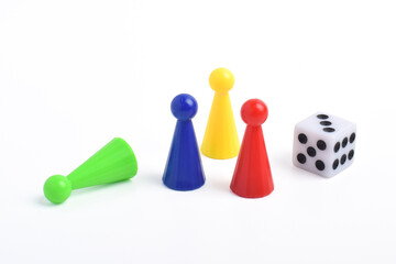 Obraz premium Playing pieces and dice isolated on white background