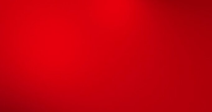 Abstract blurred red gradient background video. Smooth bright crimson and scarlet color blend. Soft fade and glow effect. Minimal modern backdrop for motion graphics, presentations, or creative design
