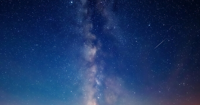Milky way stars and constellations with a galaxy background.
