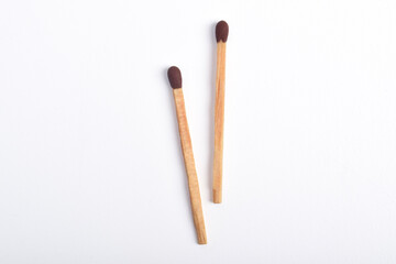 Wooden match isolated on white background