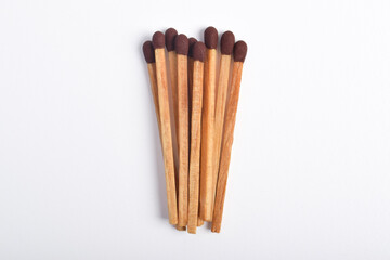 Wooden match isolated on white background. Piles of matchstick