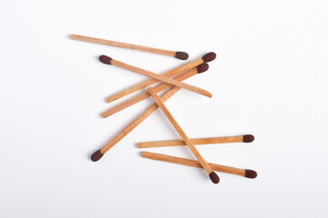 Wooden match isolated on white background. Piles of matchstick