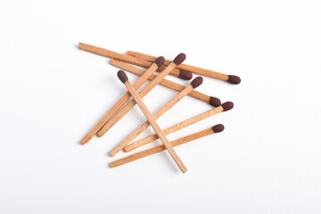 Wooden match isolated on white background. Piles of matchstick