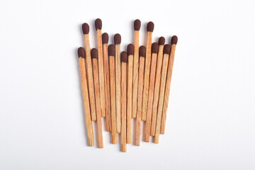 Wooden match isolated on white background. Piles of matchstick
