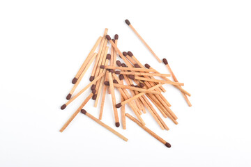 Wooden match isolated on white background. Piles of matchstick