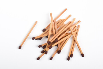 Wooden match isolated on white background. Piles of matchstick