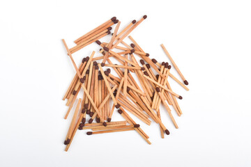 Wooden match isolated on white background. Piles of matchstick