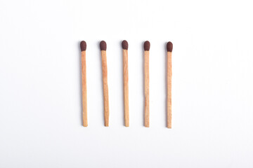 Set of wooden matches isolated on white background