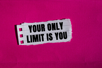 Your Only Limit is You message written on ripped torn lined paper piece on pink background....