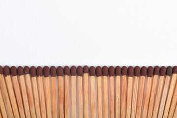 Wooden match isolated on white background, space fo text
